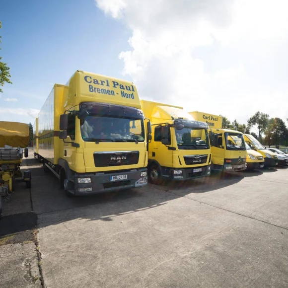 Gelbe Lastwagen des Carl-Paul-Fuhrparks